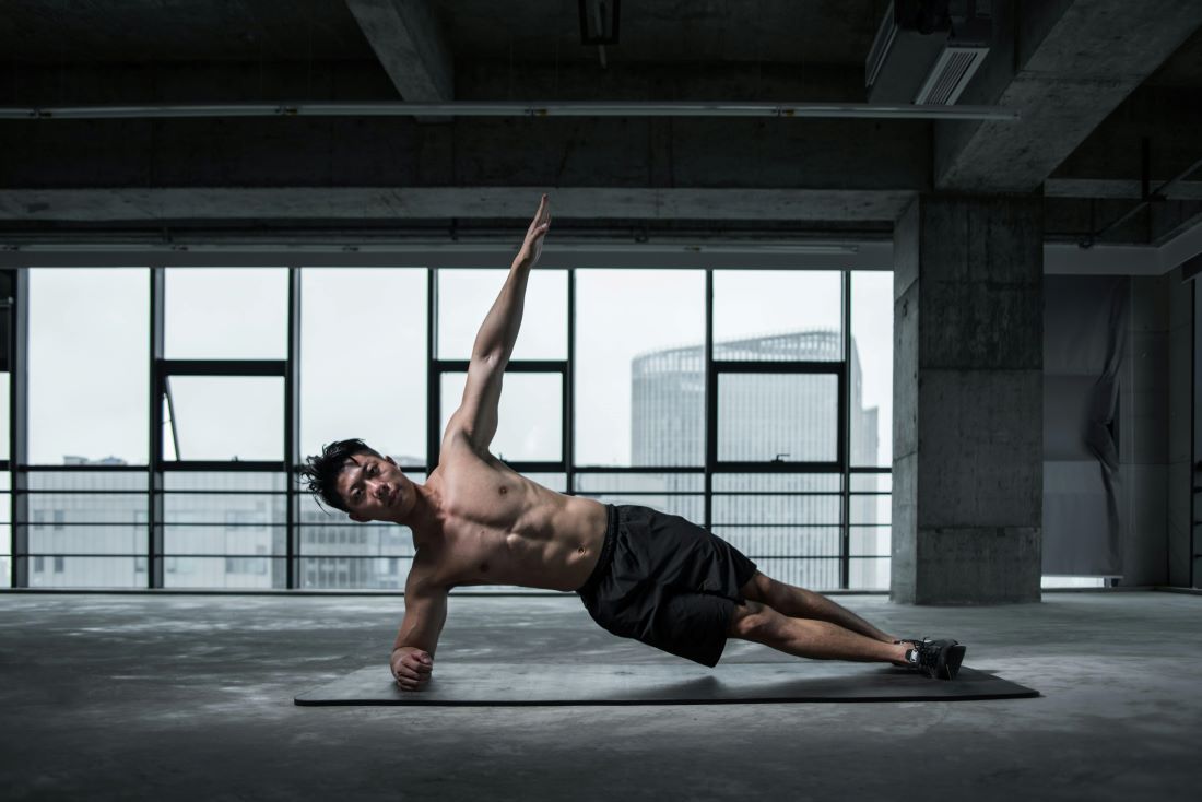 strong man doing yoga